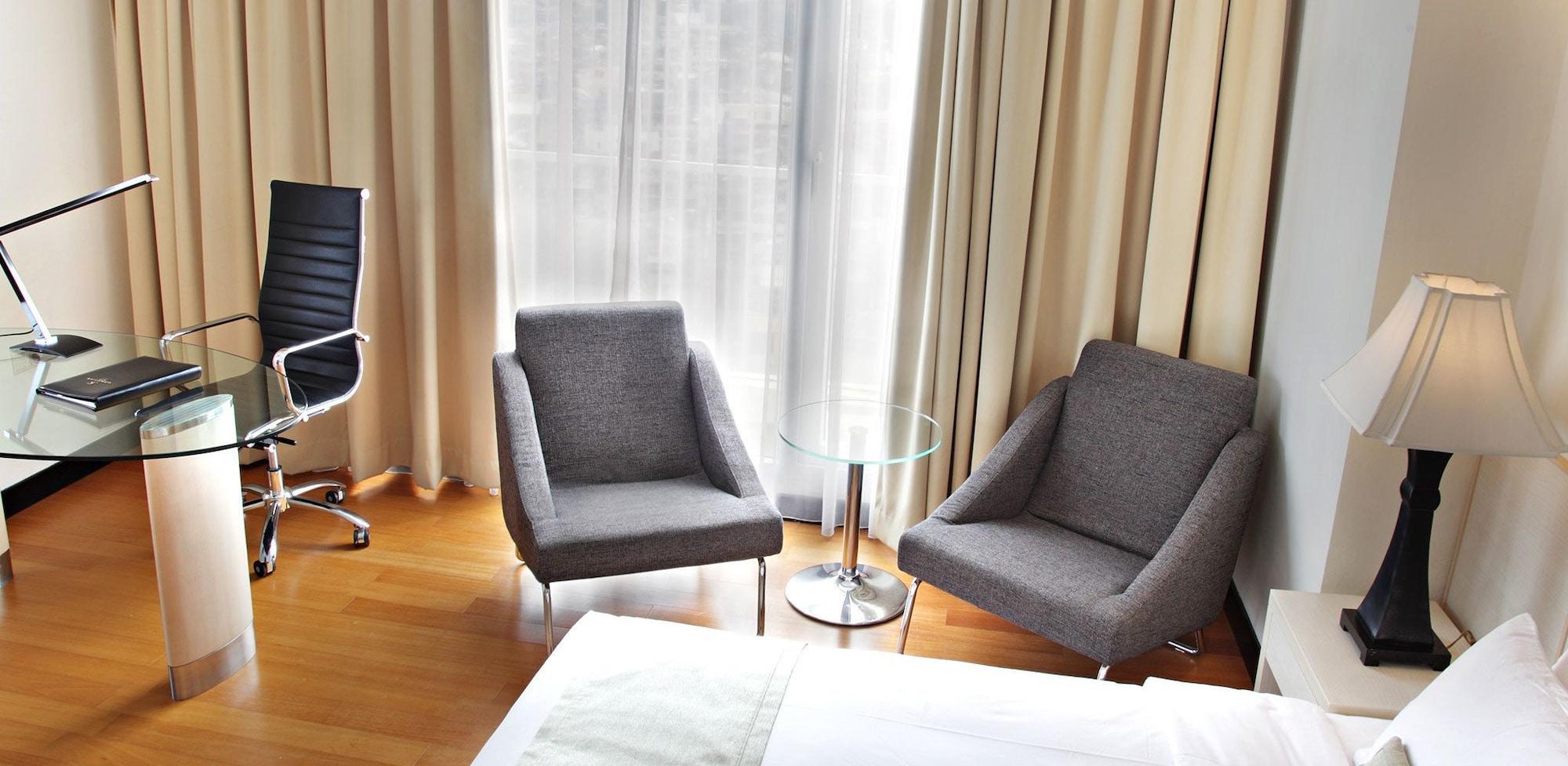 Sintesa Peninsula Hotel Манадо Екстериор снимка